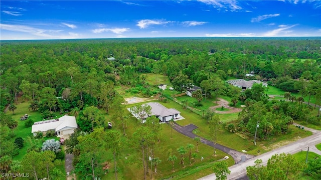 3660 4th Ave NE, Naples, FL 34120 - bird's eye view featuring a wooded view