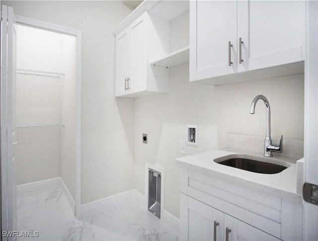 laundry room featuring washer hookup, marble finish floor, cabinet space, a sink, and electric dryer hookup