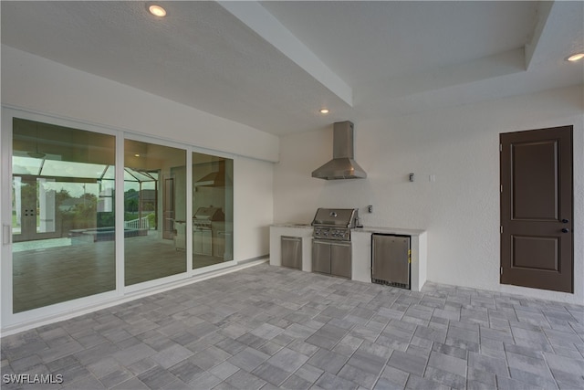 view of patio / terrace featuring area for grilling and a grill