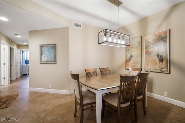 dining area with light tile patterned floors, recessed lighting, visible vents, and baseboards