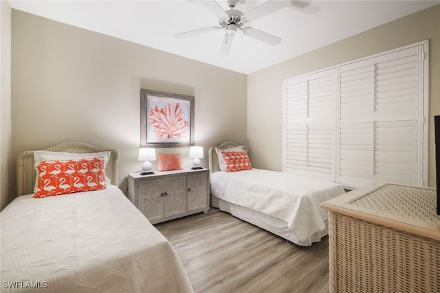 bedroom featuring ceiling fan and light wood-type flooring