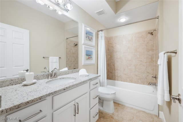 bathroom with visible vents, toilet, tile patterned flooring, shower / bathtub combination with curtain, and vanity