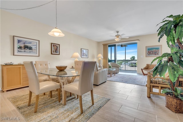 dining room featuring ceiling fan