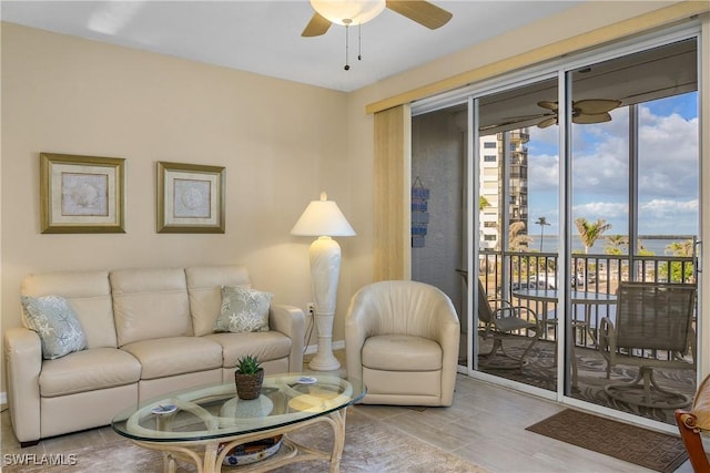 living room featuring ceiling fan