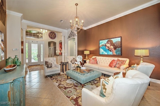 living room with french doors, ornamental molding, light tile patterned floors, and a chandelier