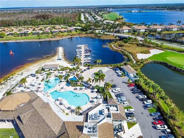 birds eye view of property featuring a water view