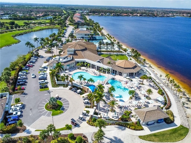 birds eye view of property featuring a water view