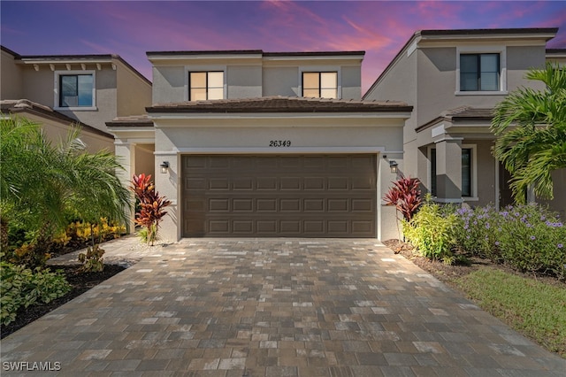 front of property featuring a garage