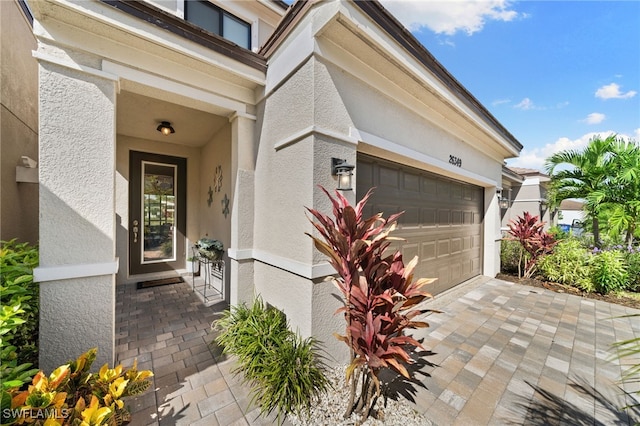 entrance to property with a garage