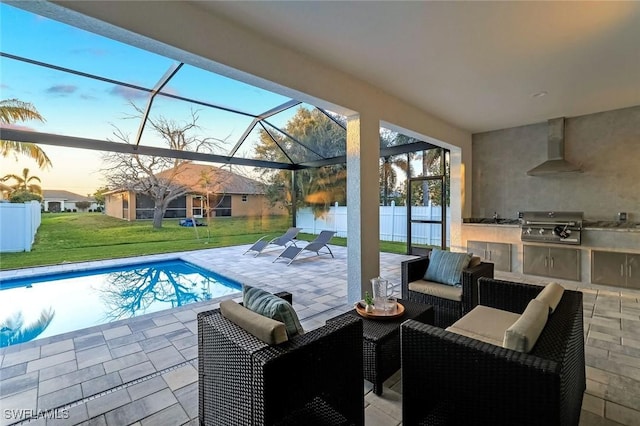 view of patio / terrace with a lanai, an outdoor hangout area, area for grilling, fence, and grilling area