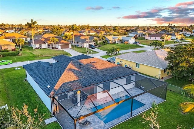 drone / aerial view with a residential view