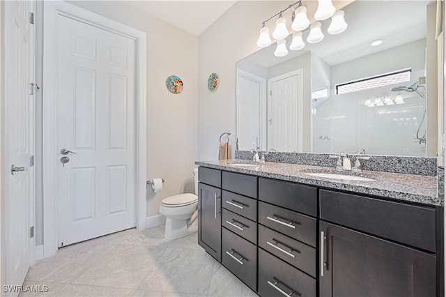 bathroom featuring tile patterned floors, walk in shower, toilet, and vanity