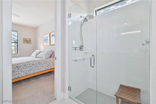 full bath with a shower stall and ensuite bathroom