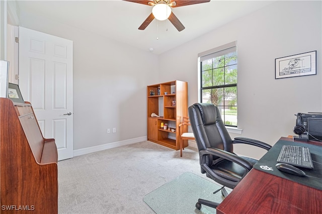 office featuring light colored carpet and ceiling fan