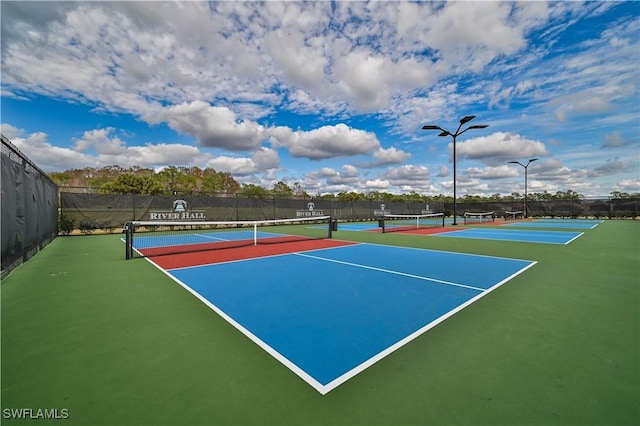 view of sport court with community basketball court and fence