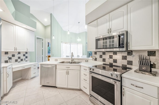 kitchen featuring white cabinets, sink, and stainless steel appliances