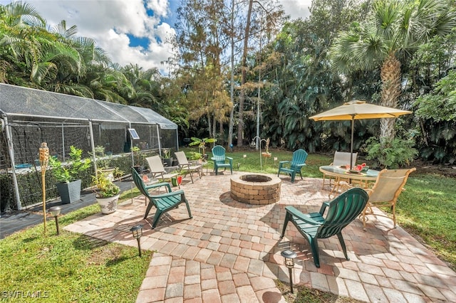 view of patio / terrace with a fire pit