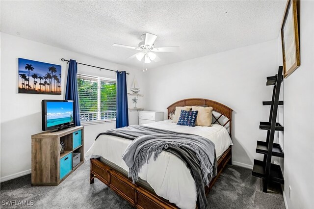 bedroom with a textured ceiling, carpet flooring, and ceiling fan