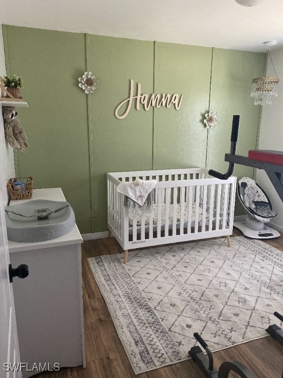 bathroom with vanity and wood-type flooring