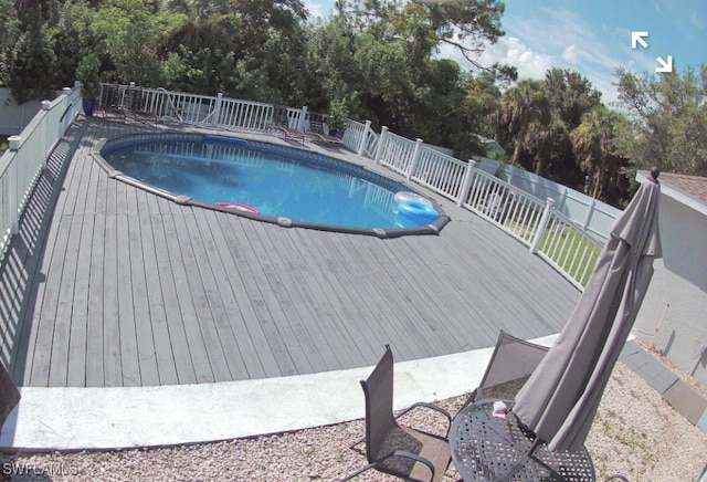 view of pool featuring a deck