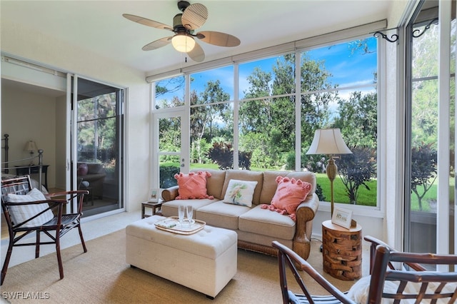 sunroom / solarium with ceiling fan