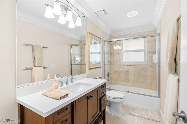 full bathroom with combined bath / shower with glass door, vanity, tile patterned flooring, crown molding, and toilet