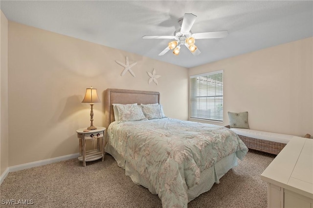 bedroom featuring light carpet, baseboards, and a ceiling fan