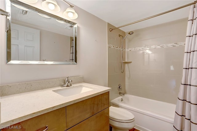 full bathroom featuring vanity, shower / bathtub combination with curtain, and toilet