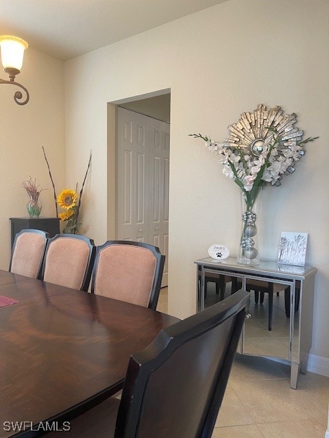 dining space with light tile patterned floors