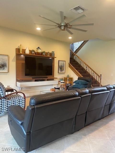 tiled living area featuring stairway, visible vents, a ceiling fan, and recessed lighting