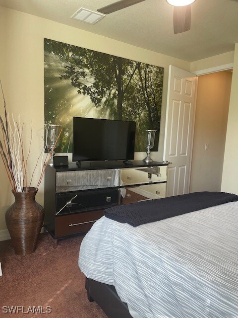 bedroom featuring carpet flooring and ceiling fan