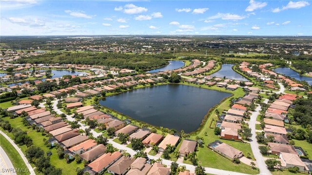 drone / aerial view featuring a water view