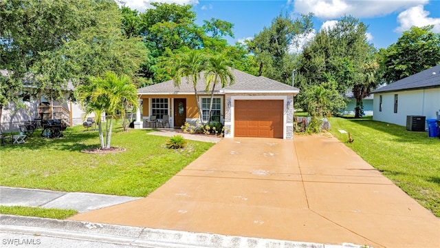 single story home with a garage, a front yard, and cooling unit