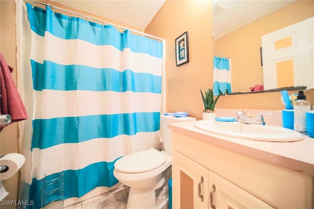 bathroom featuring a shower with curtain, tile patterned flooring, toilet, and vanity