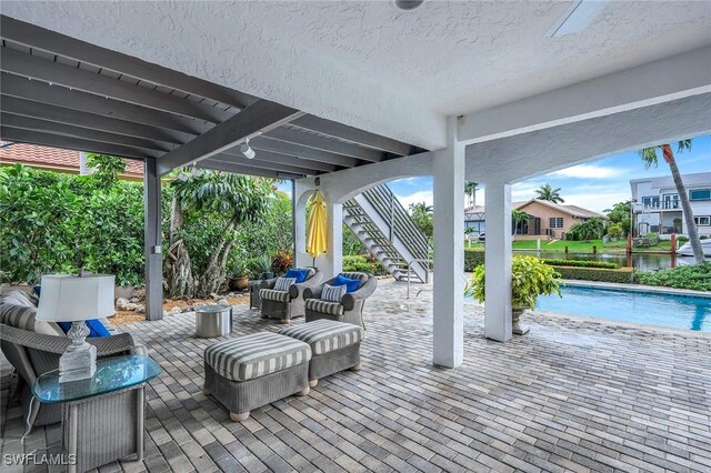 wooden deck featuring a patio area and outdoor lounge area