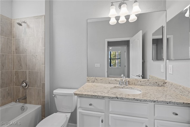 full bathroom with tiled shower / bath combo, vanity, and toilet