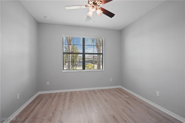 unfurnished room featuring light hardwood / wood-style flooring and ceiling fan