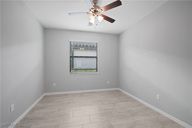 spare room with ceiling fan