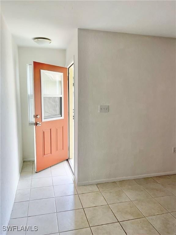 interior space featuring light tile patterned floors