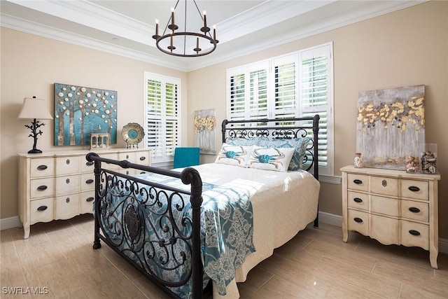 bedroom with an inviting chandelier and crown molding