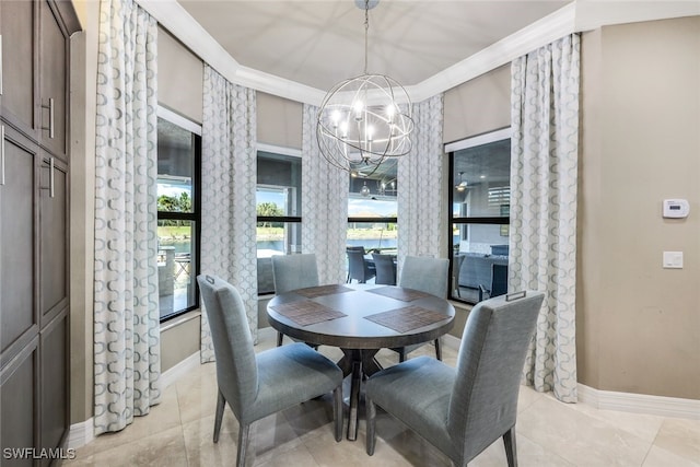 dining space featuring crown molding and an inviting chandelier