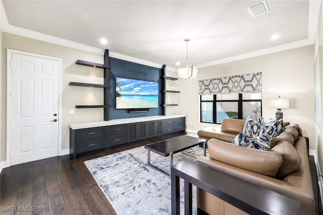 living room featuring dark hardwood / wood-style flooring and ornamental molding