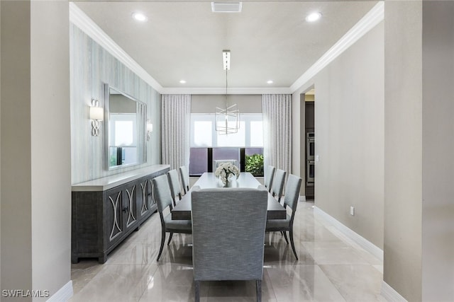 dining space featuring ornamental molding