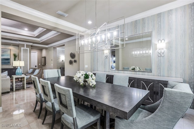 dining space featuring a raised ceiling and crown molding