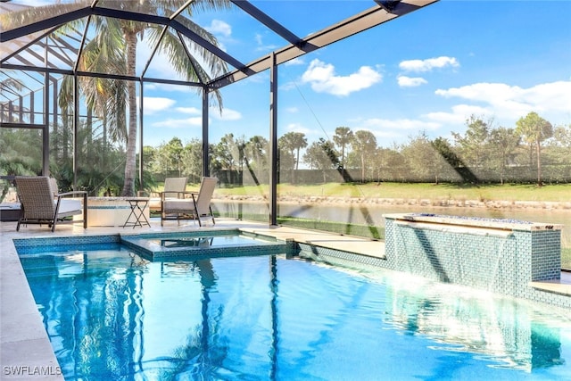 view of swimming pool with a patio area, a lanai, and an in ground hot tub