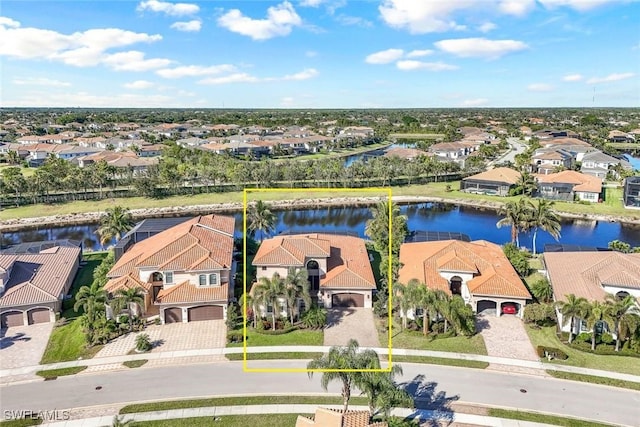 drone / aerial view featuring a water view