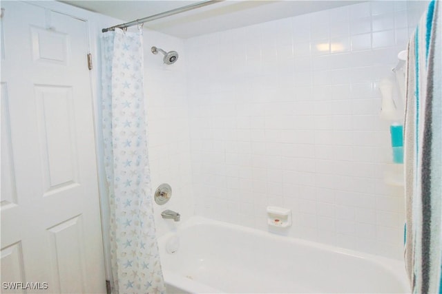 full bath with shower / bathtub combination with curtain