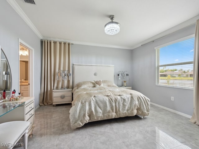 bedroom with ensuite bathroom and crown molding