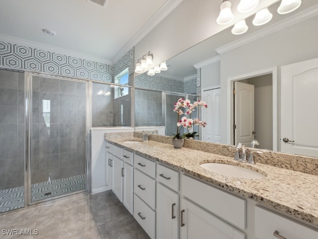 bathroom with vanity, tile patterned floors, walk in shower, and ornamental molding