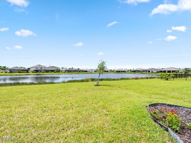 view of yard with a water view